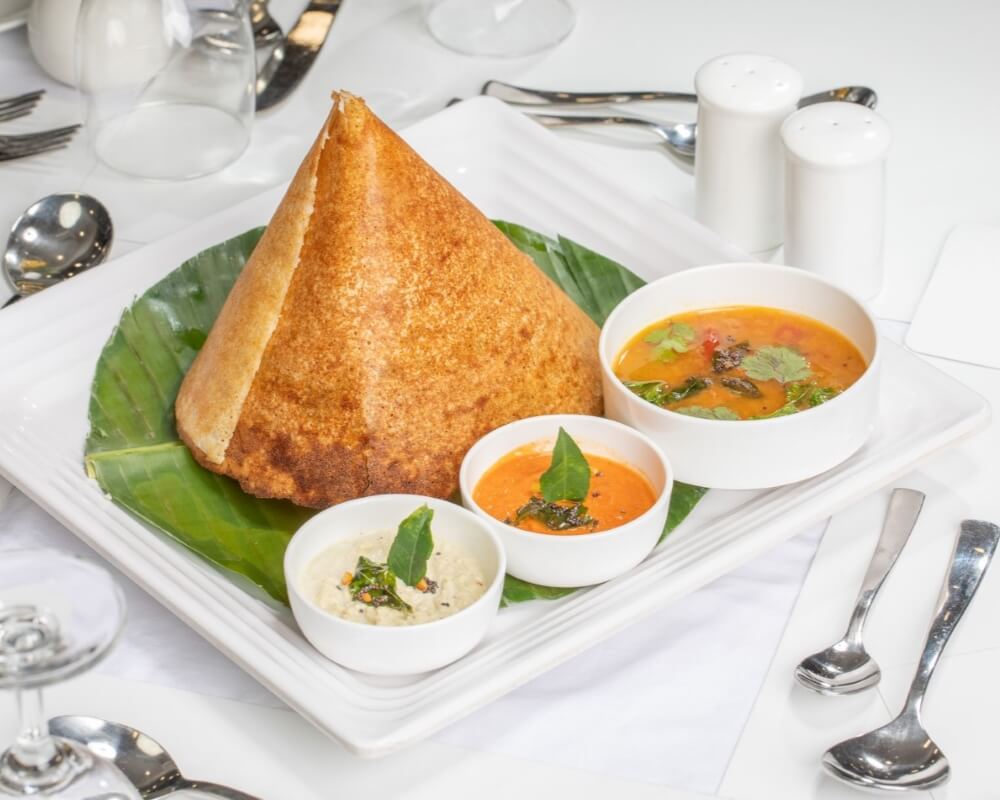 indian-street-food-masala-dosa-dhosa-masala-plain-maisuri-butter-roast-with-chutney-sambar-banana-leaf-iso