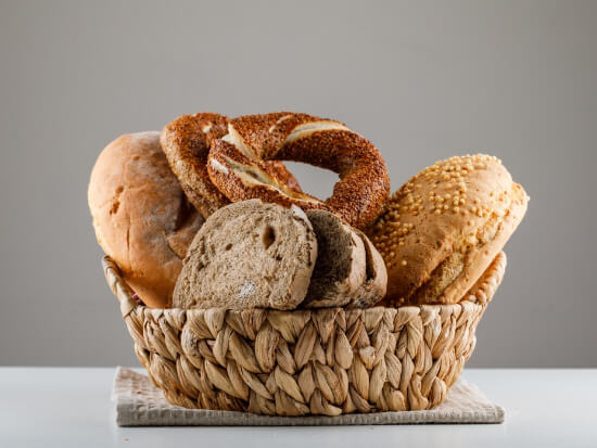 sliced-bread-with-turkish-bagel-side-view-white-gray-surface